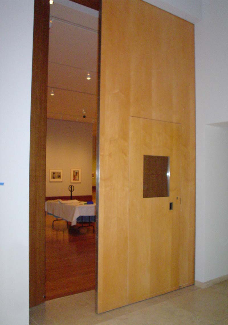 Krieger worked closely with Doortek Systems, Inc. to develop these unique sliding panels for the main galleries.