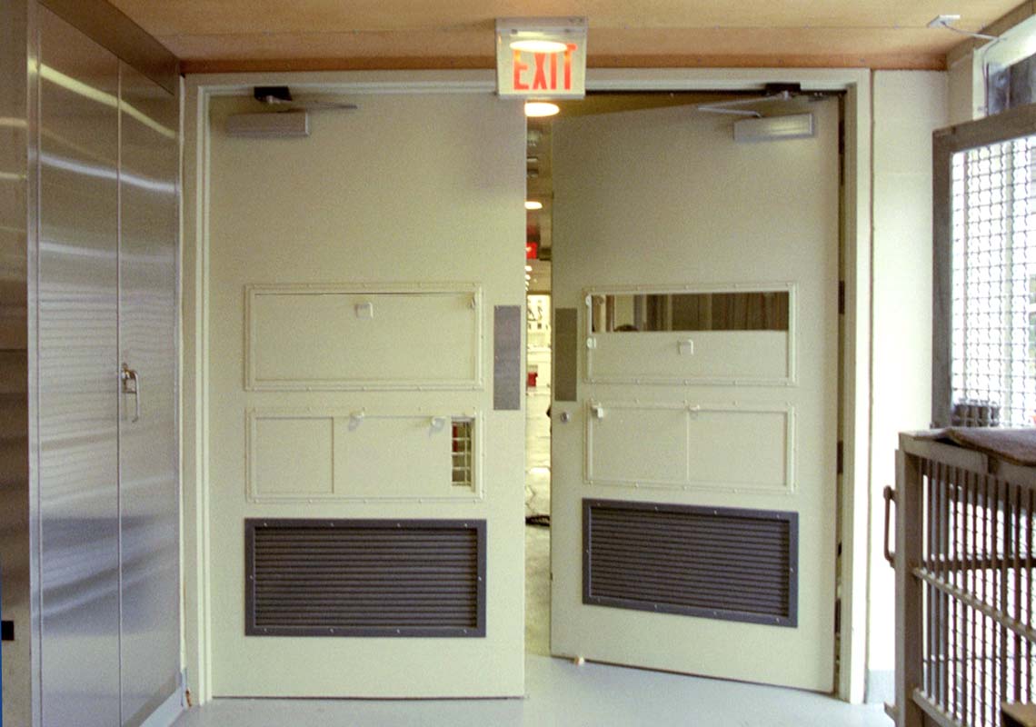 Tranquilizer “dart ports,” reinforced ventilation grates and special openings for movement
of food and equipment are built right into the door.